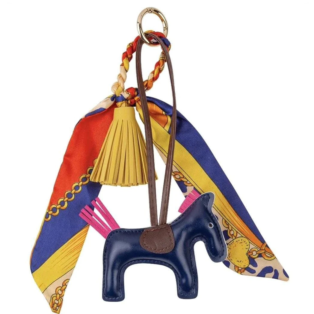 Adorable Ippico DELUXE Pony Keyring in Blue with padded faux leather tassel and satin equestrian-themed scarf. Ideal for keys, bags, or as a charming gift. Also available in Cyan, Yellow, Pink, Purple, and Red