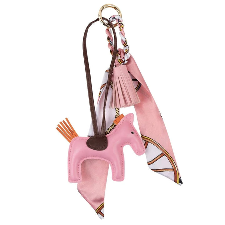 Adorable Ippico DELUXE Pony Keyring in Pink with padded faux leather tassel and satin equestrian-themed scarf. Ideal for keys, bags, or as a charming gift. Also available in Navy, Yellow, Cyan, Hot Pink, Purple, and Red