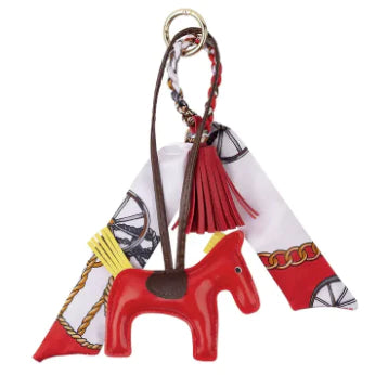 Adorable Ippico DELUXE Pony Keyring in Red with padded faux leather tassel and satin equestrian-themed scarf. Ideal for keys, bags, or as a charming gift. Also available in Navy, Yellow, Pink, Purple, and Cyan