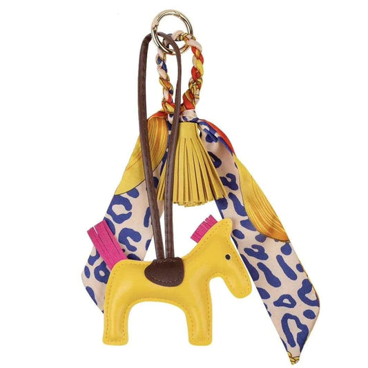 Adorable Ippico DELUXE Pony Keyring in Yellow with padded faux leather tassel and satin equestrian-themed scarf. Ideal for keys, bags, or as a charming gift. Also available in Navy, Cyan, Pink, Purple, and Red.