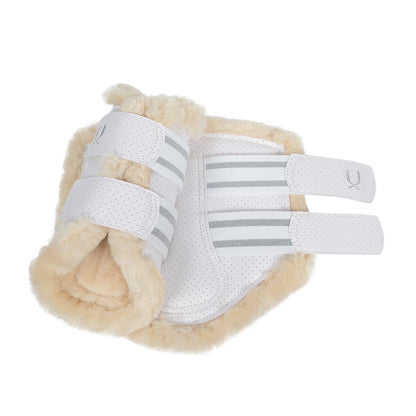 White Ippico AERO 2.0 Cool Flow Brushing Boots with faux fur lining and perforated synthetic leather, featuring strong elastic and velcro attachments for secure fit and shock absorption, suitable for front or back use.