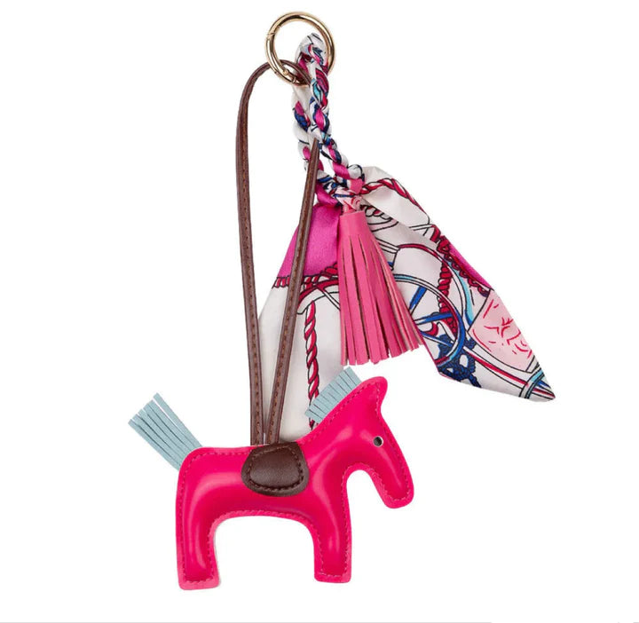 Adorable Ippico DELUXE Pony Keyring in Hot Pink with padded faux leather tassel and satin equestrian-themed scarf. Ideal for keys, bags, or as a charming gift. Also available in Navy, Yellow, Cyan, Purple, and Red